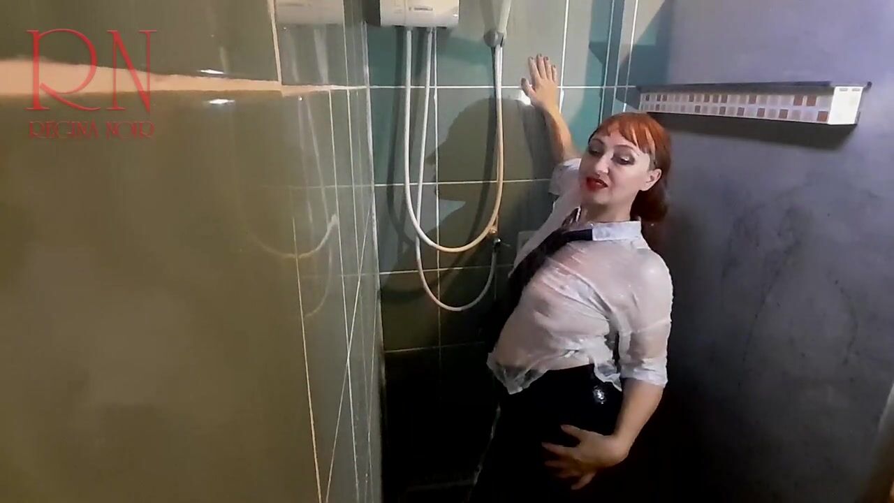 Steamy Shower Tease: Watch Her Clothes Get Soaked