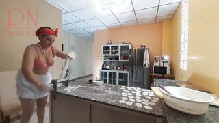 Curious Housewife Bra 1 Cooks Dinner in the Nude: A Playful Peek into Her Kitchen