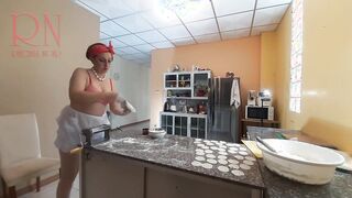 Curious Housewife Bra 1 Cooks Dinner in the Nude: A Playful Peek into Her Kitchen