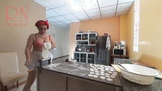 Curious Housewife Bra 1 Cooks Dinner in the Nude: A Playful Peek into Her Kitchen