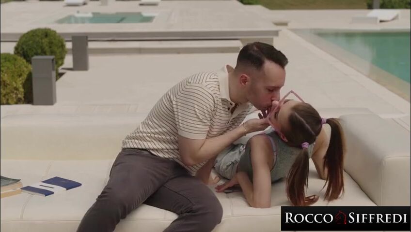 Rocco Siffredi's Poolside Encounter: Student in Pigtails Gets a Lesson from Her Charismatic Teacher