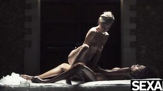 Black beauty and sexy blonde oil each other up for lesbian sex