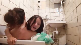 I called a friend to wash me back and dragged her to bathroom in her clothes. It was wet sex.