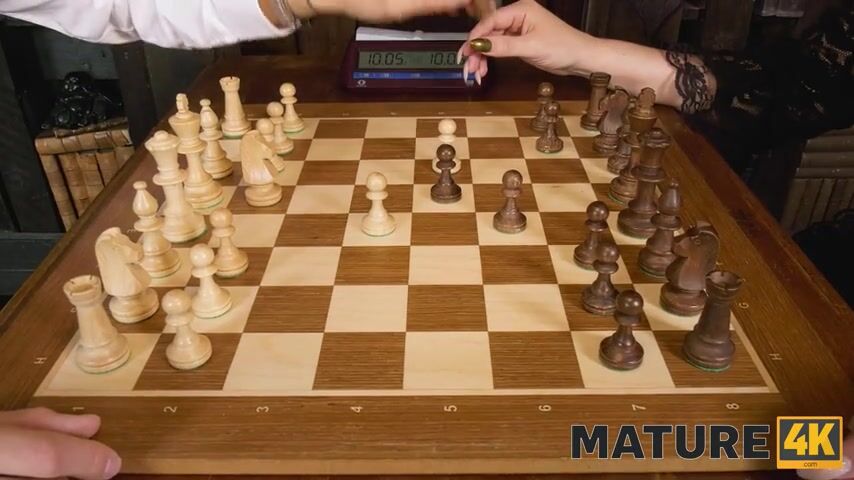 Stunning Redhead in Stockings Tempts Tommy Gold After a Game of Chess