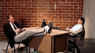 Redhead Tempts Office Workers with Natural Charm on the Desk