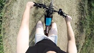 Naked and horny in public POV - Riding nude in nature, shaved body, masturbation until cumshot