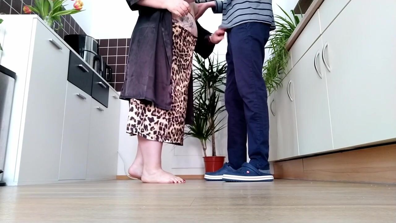 Watch this curvy milf with natural tits get pounded in the kitchen from behind