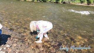 Steamy Outdoor Adventure: Sultry MILF Enjoys a Wild Moment by the Klondike River!