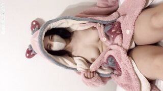 Cozy Vibes: Adorable Girl in Comfy Outfit Enjoys Solo Playtime with a Vibrator!