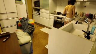 Surprising Encounter: Busty Mature Woman in a Micro Bikini Cooks at Home!