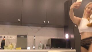 Alluring Blonde Wife in the Kitchen Teases in Shiny Black Pantyhose and Reveals a Surprise!