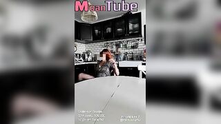 Curious Redhead MILF Enjoys a Wild Encounter with Her Young Neighbor on the Kitchen Table!