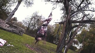 Tattooed girl in ropes gets BDSM suspension & bondage fun in the great outdoors