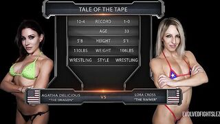 Agatha Delicious dominates Lora Cross with her strapon in hot lesbian wrestling action