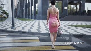 Naughty Lada flaunts her short hair & tight ass for a walk around the city