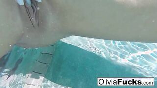 Horny Olivia plays with her pussy underwater