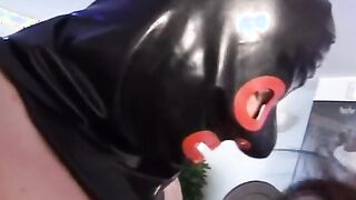 Alluring Redhead in Latex Receives a Surprise Finish