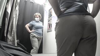 I'm in the fitting room trying on pants.