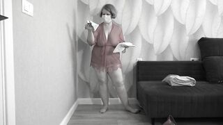 Mature BBW MILF tries on a nurse uniform.