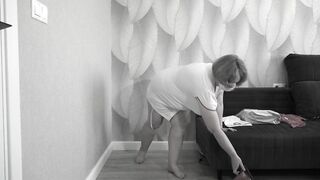 Mature BBW MILF tries on a nurse uniform.