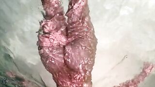 Vibrant Pink Beauty in a Relaxing Hot Tub Adventure