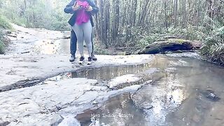 Charming Couple Enjoys a Romantic Moment by the River - Adventurous Outdoor Connection