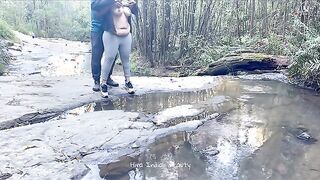 Charming Couple Enjoys a Romantic Moment by the River - Adventurous Outdoor Connection