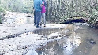Charming Couple Enjoys a Romantic Moment by the River - Adventurous Outdoor Connection