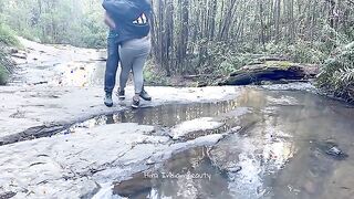 Charming Couple Enjoys a Romantic Moment by the River - Adventurous Outdoor Connection