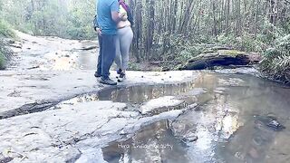 Charming Couple Enjoys a Romantic Moment by the River - Adventurous Outdoor Connection