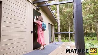 Steamy Sauna Encounter: Mature Redhead Enjoys Intense Pleasure