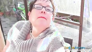 Charming Mature Beauty Enjoys a Winter Escape in the Garden