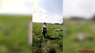Busty Redhead Enjoys a Topless Stroll in Nature This Easter!