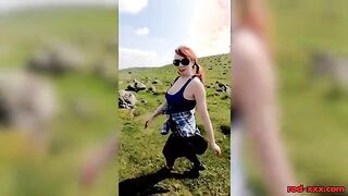 Busty Redhead Enjoys a Topless Stroll in Nature This Easter!