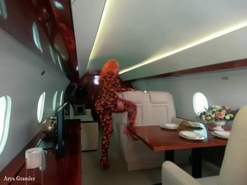 Behind the Scenes: Stunning Photoshoot with 4 Catsuits and a Jet Adventure!