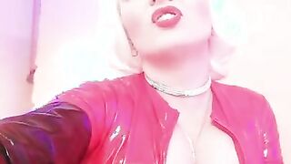 Discover the Allure of Fetish Fashion: Stunning Red PVC Catsuit & Corset with a Touch of Foot Temptation
