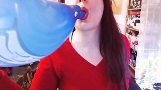 Experience the Thrill: Watch Nicoletta Embassi Play with a Big Blue Balloon!