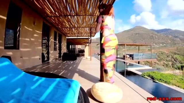 Curious Redhead MILF Enjoys a Steamy Moment by the Poolside