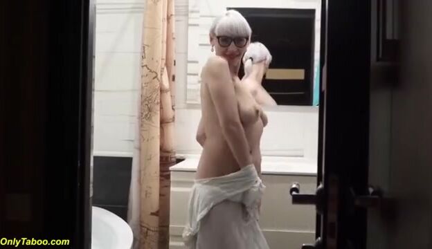 Stepmom's Soapy Bathtub Adventure: A First Video Experience with Mature Charm