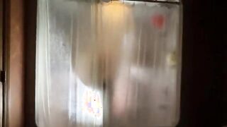 Steamy Shower Session with Aunt Ann: A Tempting Tease of Legs and Curves