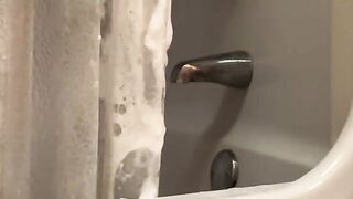Steamy Shower Session with Aunt Ann: A Tempting Tease of Legs and Curves