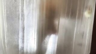 Steamy Shower Session with Aunt Ann: A Tempting Tease of Legs and Curves