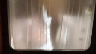 Steamy Shower Session with Aunt Ann: A Tempting Tease of Legs and Curves