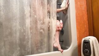 Steamy Shower Session with Aunt Ann: A Tempting Tease of Legs and Curves
