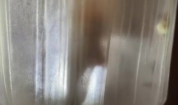 Steamy Shower Session with Aunt Ann: A Tempting Tease of Legs and Curves