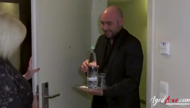 Lacey Starr's Alluring Encounter: Busty Blonde Tempts Handy Guy for Intense Fun!
