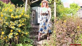 Busty babe Red XXX fingers herself in the garden