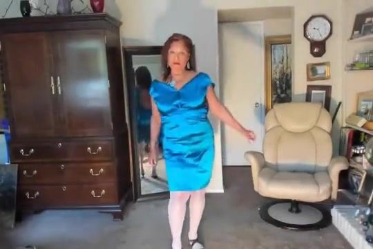 mature Latine woman dancing striptease & masturbating